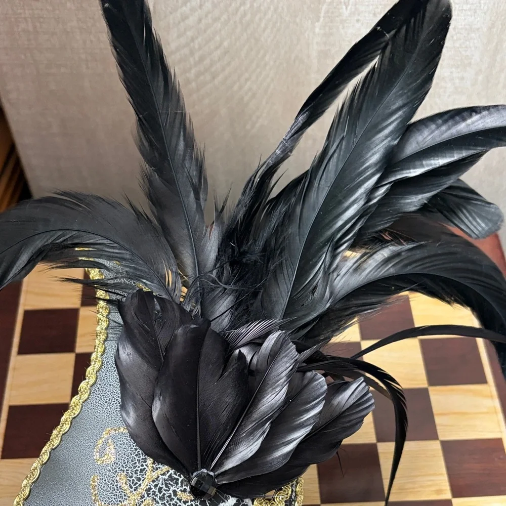 Elegant Black and Gold Masquerade Mask with Feathers